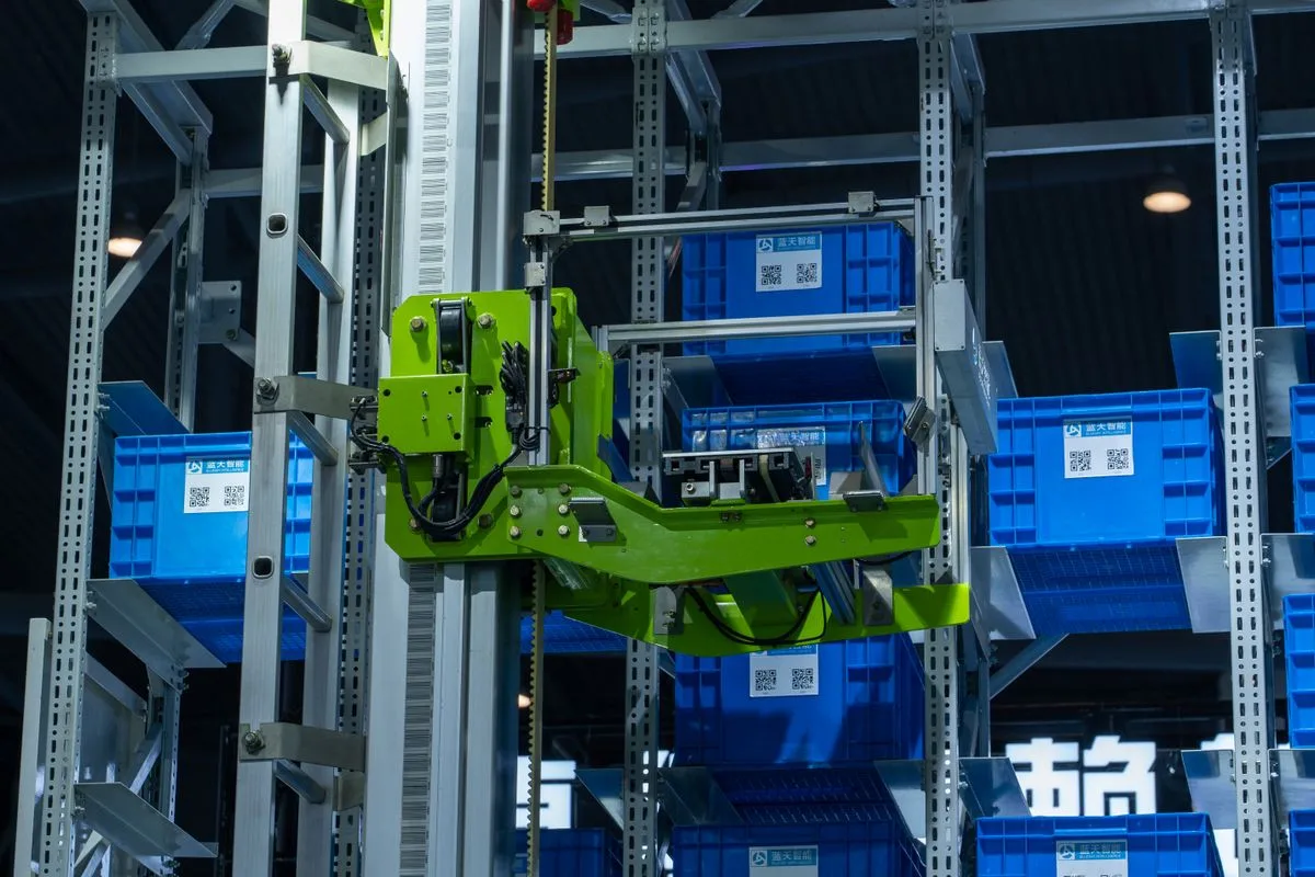 Automated warehouse equipment moving storage containers